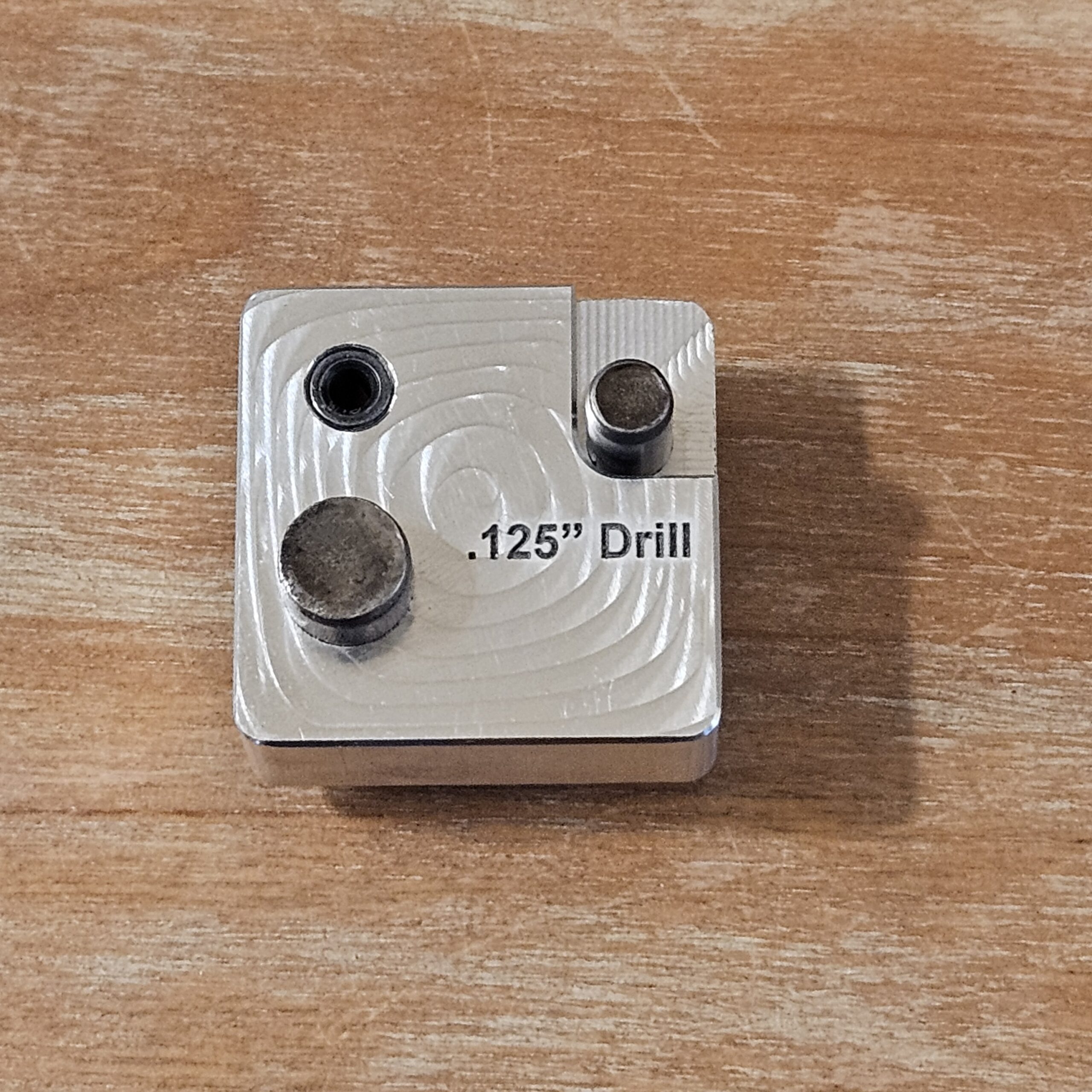 SOT Micro-Jig mounted on AR-15 lower jig showing dual-side drill bushings
